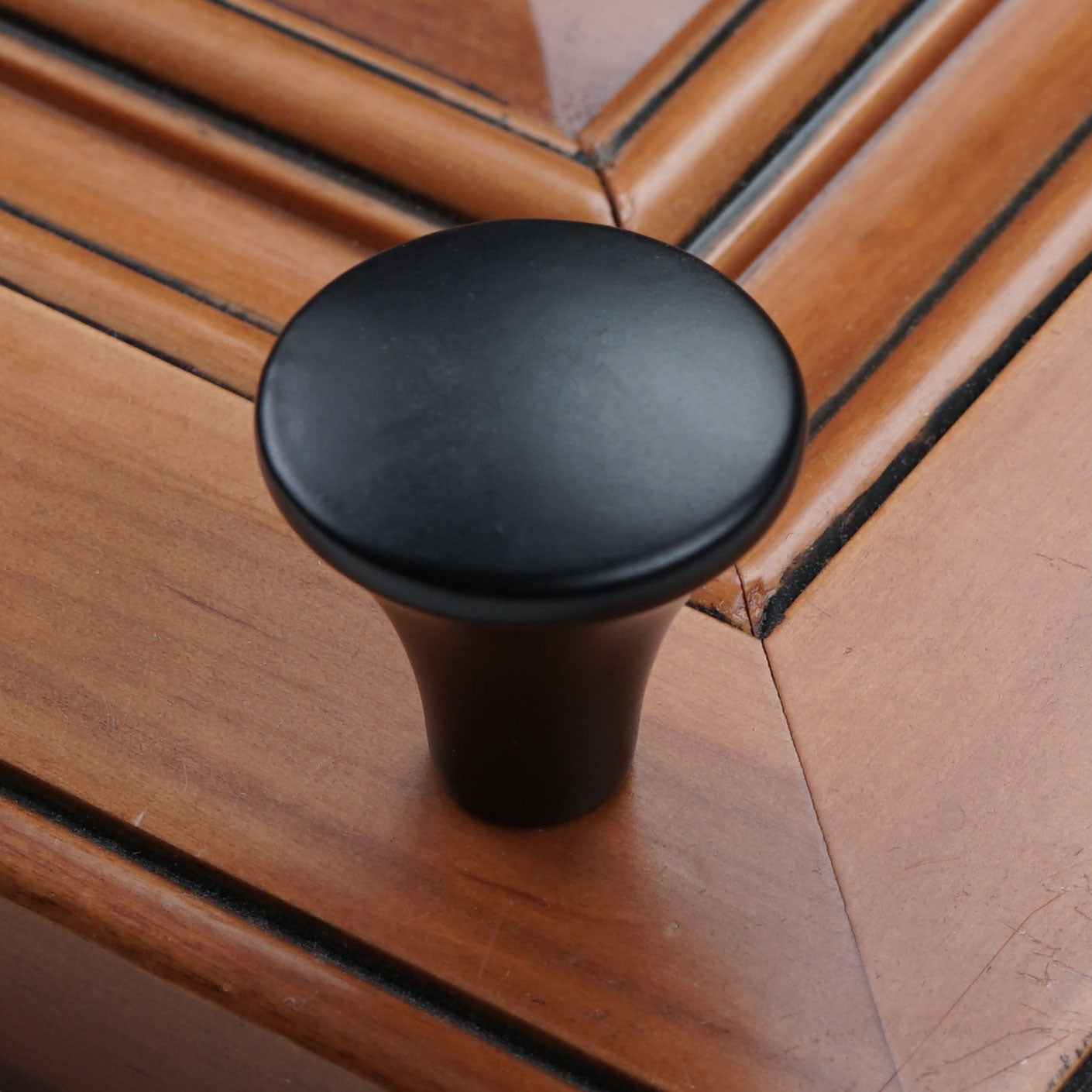 Installed 1-1/16" Tapered Cabinet Knob - Solid Zinc